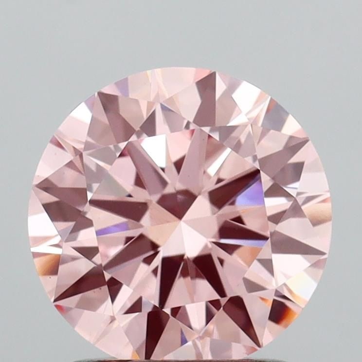 Loose Diamond - ROUND 1.5ct Fancy Vivid Pink VVS2: Loose Diamond - ROUND 1.5ct Fancy Vivid Pink VVS2 Source: This is a real non-mined Diamond that has been grown in a lab Shape: ROUND Carats: 1.5 Color: Fancy Vivid Pink Certification: IGI Video: