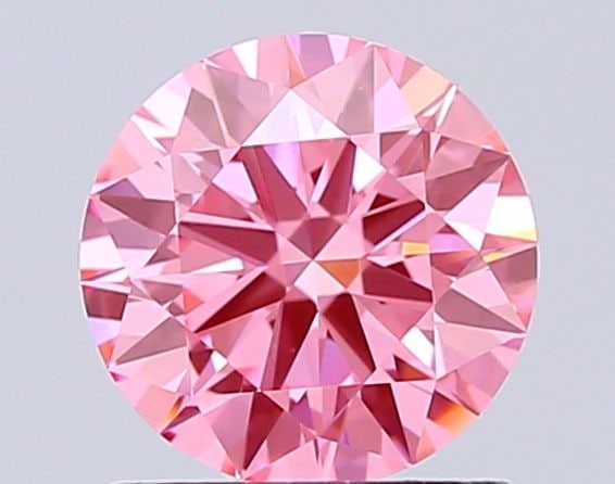 Loose Diamond - ROUND 1.0ct Fancy Vivid Pink VVS2: Loose Diamond - ROUND 1.0ct Fancy Vivid Pink VVS2 Source: This is a real non-mined Diamond that has been grown in a lab Shape: ROUND Carats: 1.0 Color: Fancy Vivid Pink Certification: IGI Video:
