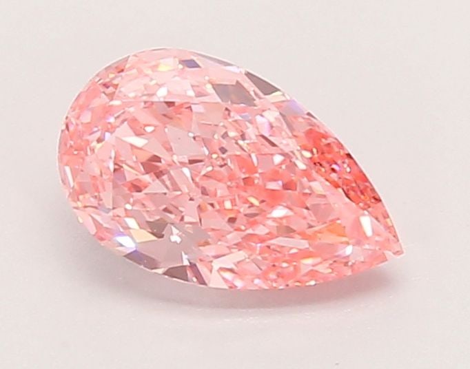 Loose Diamond - PEAR 0.94ct Fancy Vivid Pink VS1: Loose Diamond - PEAR 0.94ct Fancy Vivid Pink VS1 Source: This is a real non-mined Diamond that has been grown in a lab Shape: PEAR Carats: 0.94 Color: Fancy Vivid Pink Certification: IGI Video: