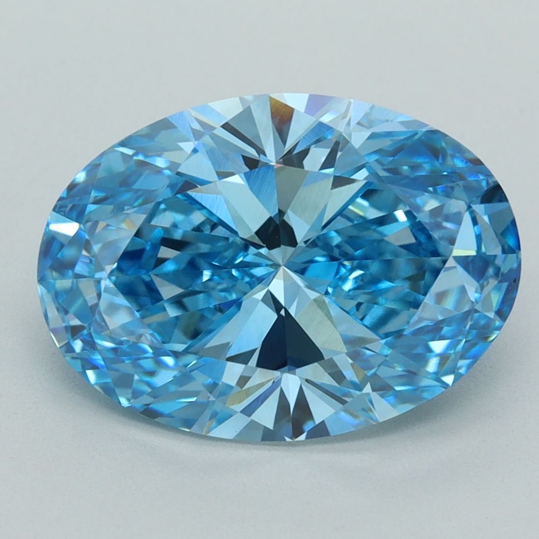 Loose Diamond - OVAL 5.11ct Fancy Vivid Blue VVS2: Loose Diamond - OVAL 5.11ct Fancy Vivid Blue VVS2 Source: This is a real non-mined Diamond that has been grown in a lab Shape: OVAL Carats: 5.11 Color: Fancy Vivid Blue Certification: IGI Video: