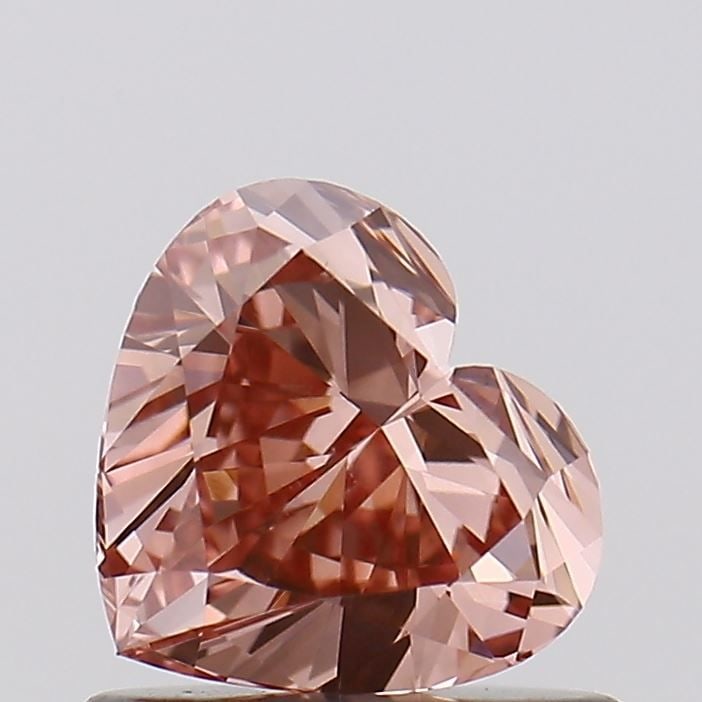 Loose Diamond - HEART 0.78ct Fancy Pinkish Brown VS1: Loose Diamond - HEART 0.78ct Fancy Pinkish Brown VS1 Source: This is a real non-mined Diamond that has been grown in a lab Shape: HEART Carats: 0.78 Color: Fancy Pinkish Brown Certification: NONE Vide