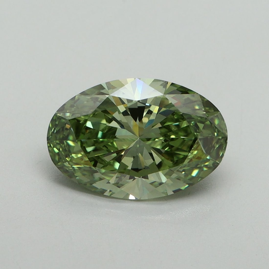 Loose Diamond - OVAL 2.1ct Fancy Vivid Green VVS2: Loose Diamond - OVAL 2.1ct Fancy Vivid Green VVS2 Source: This is a real non-mined Diamond that has been grown in a lab Shape: OVAL Carats: 2.1 Color: Fancy Vivid Green Certification: IGI Video: