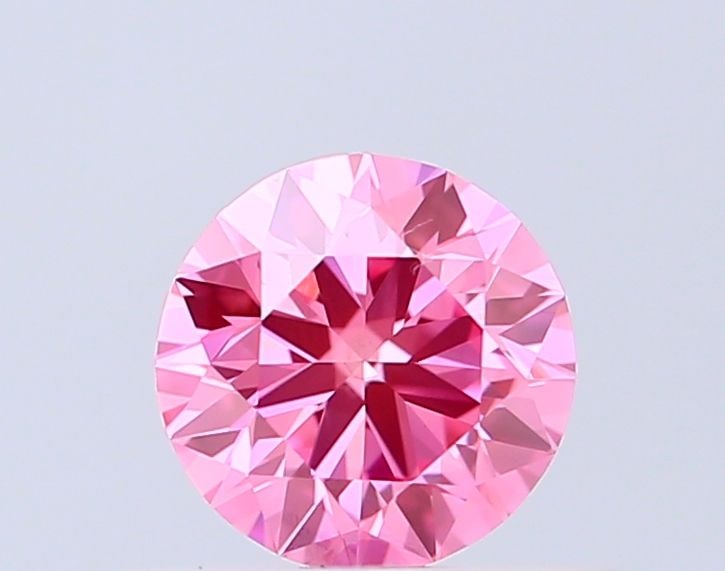 Ideal Loose Diamond - ROUND 0.5ct Fancy Vivid Pink VVS2: Ideal Loose Diamond - ROUND 0.5ct Fancy Vivid Pink VVS2 Source: This is a real non-mined Diamond that has been grown in a lab Shape: ROUND Carats: 0.5 Color: Fancy Vivid Pink Certification: IGI Video: