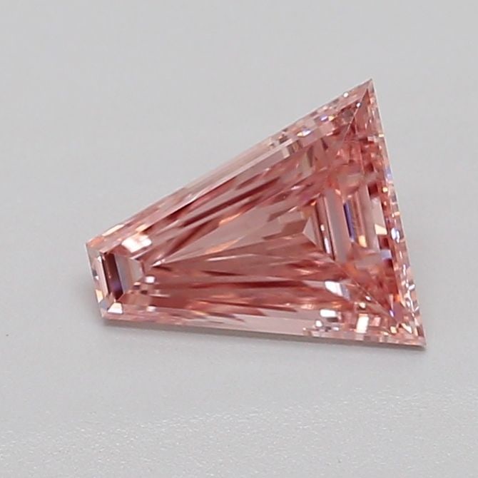 Loose Diamond - TAPERED BAGUETTE 0.63ct Fancy Intense Pink VS1: Loose Diamond - TAPERED BAGUETTE 0.63ct Fancy Intense Pink VS1 Source: This is a real non-mined Diamond that has been grown in a lab Shape: TAPERED BAGUETTE Carats: 0.63 Color: Fancy Intense Pink Cert
