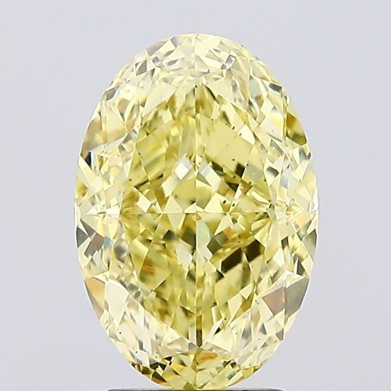 Loose Diamond - OVAL 3.06ct Fancy Vivid Yellow VS2: Loose Diamond - OVAL 3.06ct Fancy Vivid Yellow VS2 Source: This is a real non-mined Diamond that has been grown in a lab Shape: OVAL Carats: 3.06 Color: Fancy Vivid Yellow Certification: IGI Video: