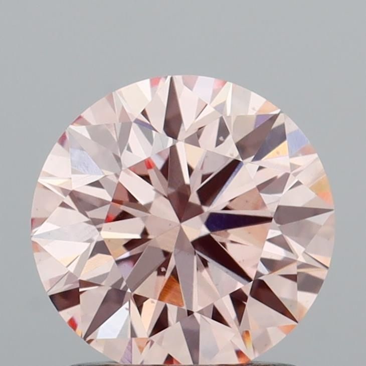 Ideal Loose Diamond - ROUND 1.32ct Fancy Pink VS2: Ideal Loose Diamond - ROUND 1.32ct Fancy Pink VS2 Source: This is a real non-mined Diamond that has been grown in a lab Shape: ROUND Carats: 1.32 Color: Fancy Pink Certification: IGI Video: