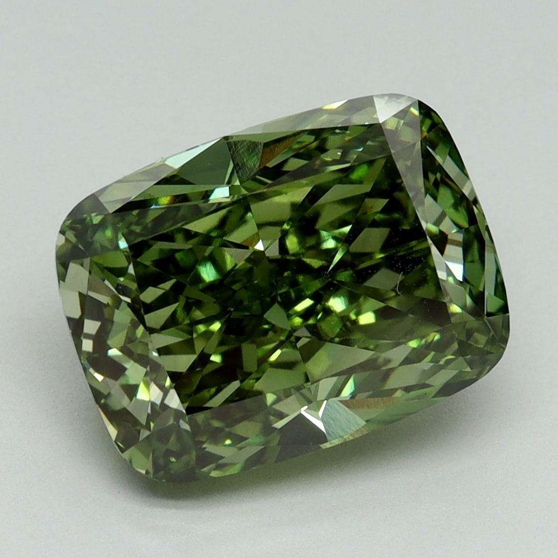 Loose Diamond - CUSHION MODIFIED 5.28ct Fancy Vivid Green VS1: Loose Diamond - CUSHION MODIFIED 5.28ct Fancy Vivid Green VS1 Source: This is a real non-mined Diamond that has been grown in a lab Shape: CUSHION MODIFIED Carats: 5.28 Color: Fancy Vivid Green Certif