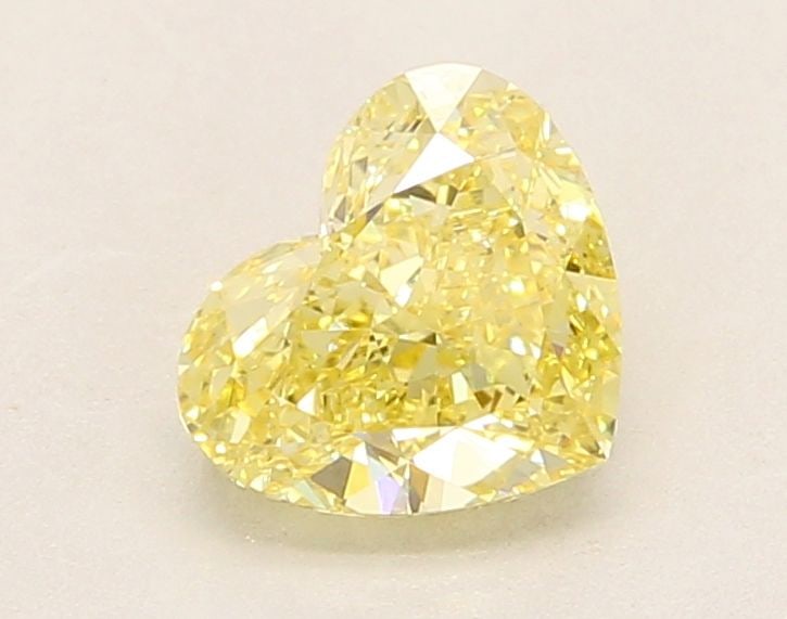 Loose Diamond - HEART 1.51ct Fancy Intense Yellow VS1: Loose Diamond - HEART 1.51ct Fancy Intense Yellow VS1 Source: This is a real non-mined Diamond that has been grown in a lab Shape: HEART Carats: 1.51 Color: Fancy Intense Yellow Certification: IGI Vid