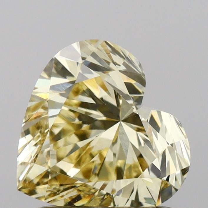 Loose Diamond - HEART 1.2ct Fancy Yellow VVS2: Loose Diamond - HEART 1.2ct Fancy Yellow VVS2 Source: This is a real non-mined Diamond that has been grown in a lab Shape: HEART Carats: 1.2 Color: Fancy Yellow Certification: IGI Video: