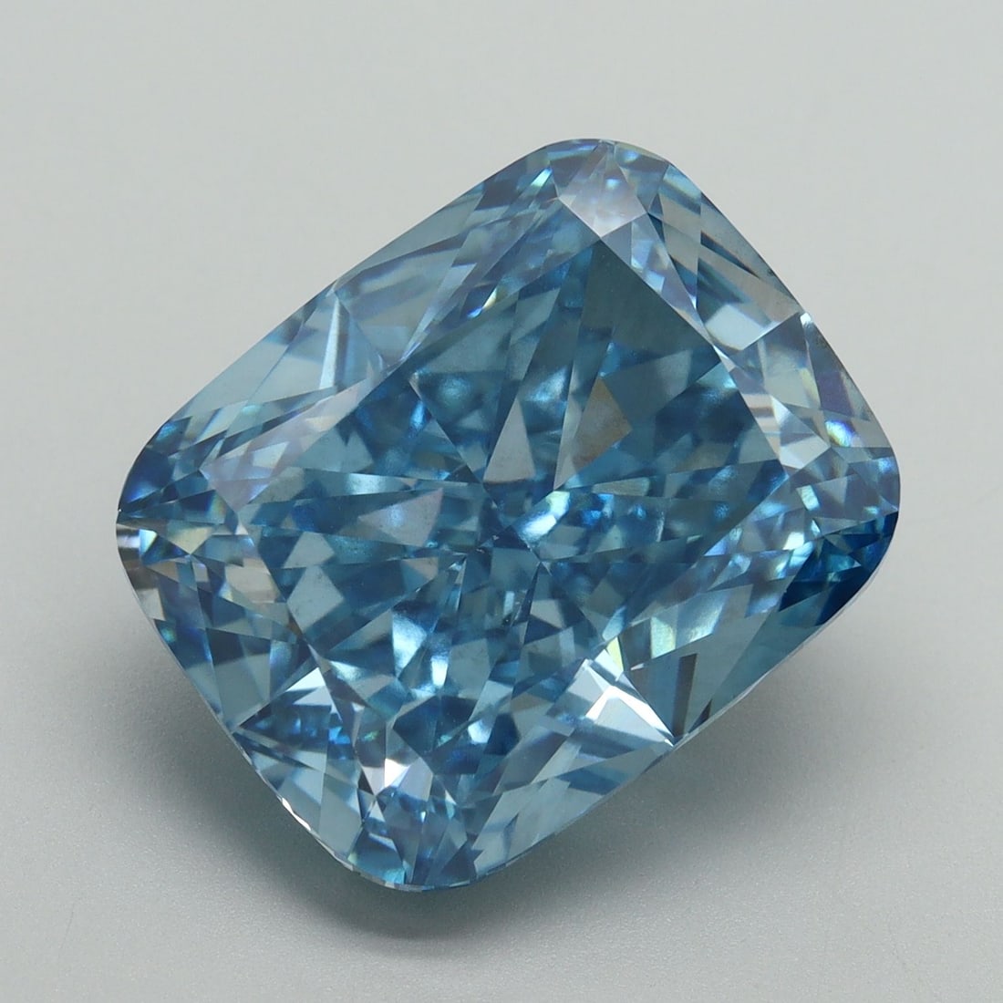 Loose Diamond - CUSHION MODIFIED 12.55ct Fancy Vivid Blue VS2: Loose Diamond - CUSHION MODIFIED 12.55ct Fancy Vivid Blue VS2 Source: This is a real non-mined Diamond that has been grown in a lab Shape: CUSHION MODIFIED Carats: 12.55 Color: Fancy Vivid Blue Certif