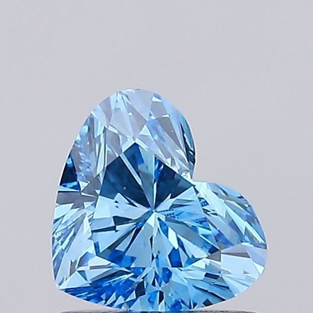 Loose Diamond - HEART 0.88ct Fancy Vivid Blue VS1: Loose Diamond - HEART 0.88ct Fancy Vivid Blue VS1 Source: This is a real non-mined Diamond that has been grown in a lab Shape: HEART Carats: 0.88 Color: Fancy Vivid Blue Certification: IGI Video: