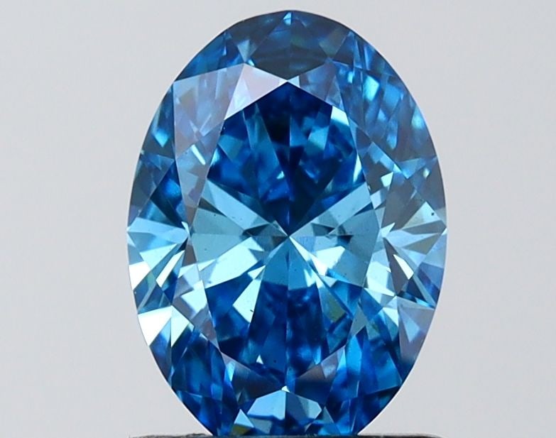 Loose Diamond - OVAL 1.53ct Fancy Vivid Blue VS2: Loose Diamond - OVAL 1.53ct Fancy Vivid Blue VS2 Source: This is a real non-mined Diamond that has been grown in a lab Shape: OVAL Carats: 1.53 Color: Fancy Vivid Blue Certification: IGI Video:
