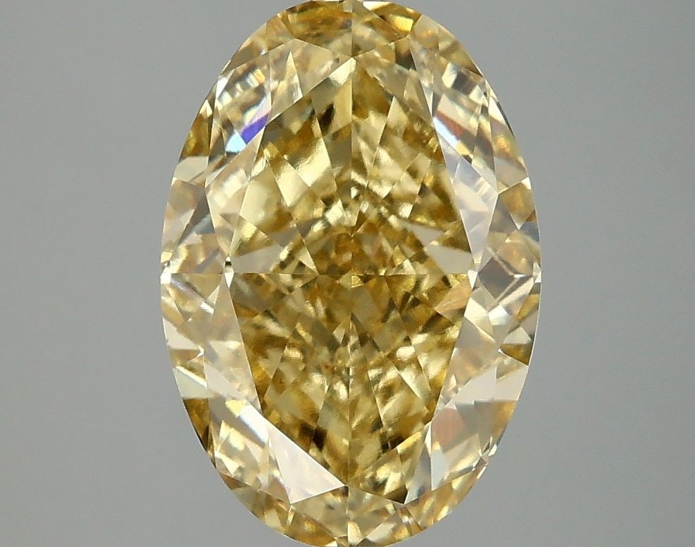 Loose Diamond - OVAL 4.08ct Fancy Vivid Yellow VS1: Loose Diamond - OVAL 4.08ct Fancy Vivid Yellow VS1 Source: This is a real non-mined Diamond that has been grown in a lab Shape: OVAL Carats: 4.08 Color: Fancy Vivid Yellow Certification: IGI Video: