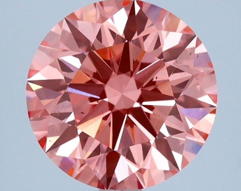Ideal Loose Diamond - ROUND 2.36ct Fancy Vivid Pink SI1: Ideal Loose Diamond - ROUND 2.36ct Fancy Vivid Pink SI1 Source: This is a real non-mined Diamond that has been grown in a lab Shape: ROUND Carats: 2.36 Color: Fancy Vivid Pink Certification: IGI Video