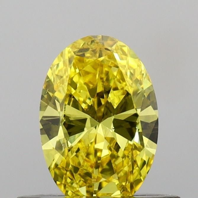 Loose Diamond - OVAL 0.44ct Fancy Vivid Yellow VS1: Loose Diamond - OVAL 0.44ct Fancy Vivid Yellow VS1 Source: This is a real non-mined Diamond that has been grown in a lab Shape: OVAL Carats: 0.44 Color: Fancy Vivid Yellow Certification: IGI Video: