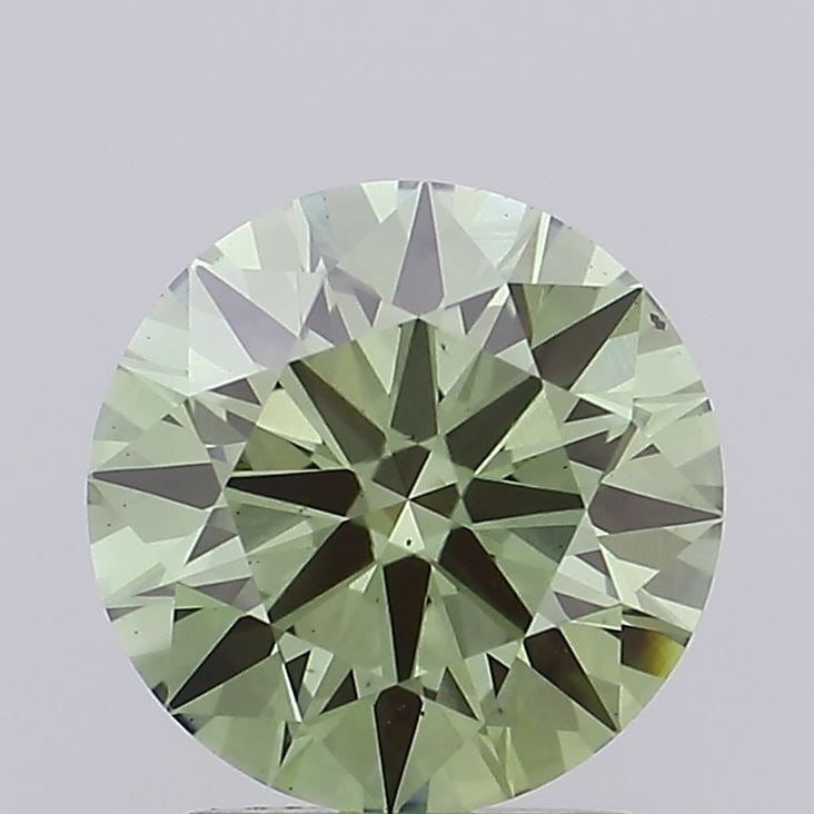 Ideal Loose Diamond - ROUND 1.55ct Fancy Vivid Green VS2: Ideal Loose Diamond - ROUND 1.55ct Fancy Vivid Green VS2 Source: This is a real non-mined Diamond that has been grown in a lab Shape: ROUND Carats: 1.55 Color: Fancy Vivid Green Certification: IGI Vid