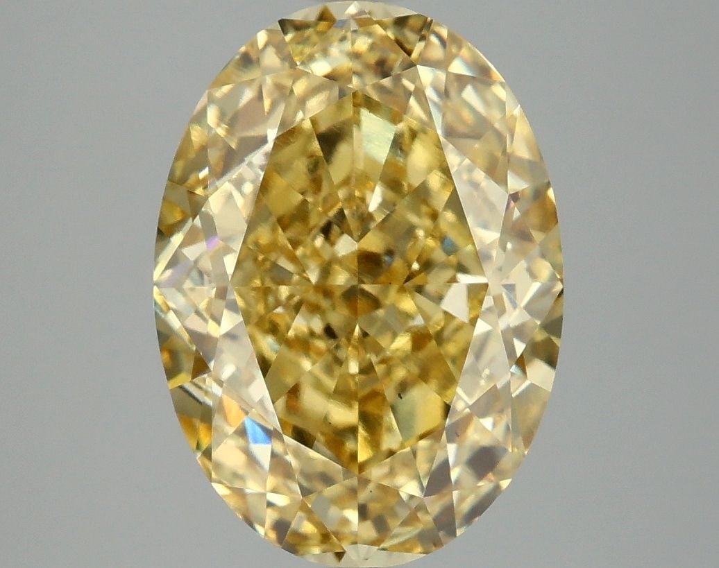 Loose Diamond - OVAL 5.05ct Fancy Vivid Yellow VS1: Loose Diamond - OVAL 5.05ct Fancy Vivid Yellow VS1 Source: This is a real non-mined Diamond that has been grown in a lab Shape: OVAL Carats: 5.05 Color: Fancy Vivid Yellow Certification: IGI Video: