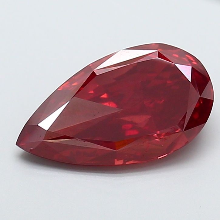 Loose Diamond - PEAR 6.52ct Fancy Vivid Red VS2: Loose Diamond - PEAR 6.52ct Fancy Vivid Red VS2 Source: This is a real non-mined Diamond that has been grown in a lab Shape: PEAR Carats: 6.52 Color: Fancy Vivid Red Certification: NONE Video: