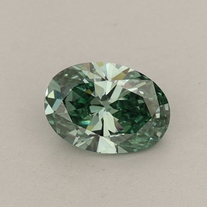 Loose Diamond - OVAL 0.42ct Fancy Vivid Green VS1: Loose Diamond - OVAL 0.42ct Fancy Vivid Green VS1 Source: This is a real non-mined Diamond that has been grown in a lab Shape: OVAL Carats: 0.42 Color: Fancy Vivid Green Certification: IGI Video: