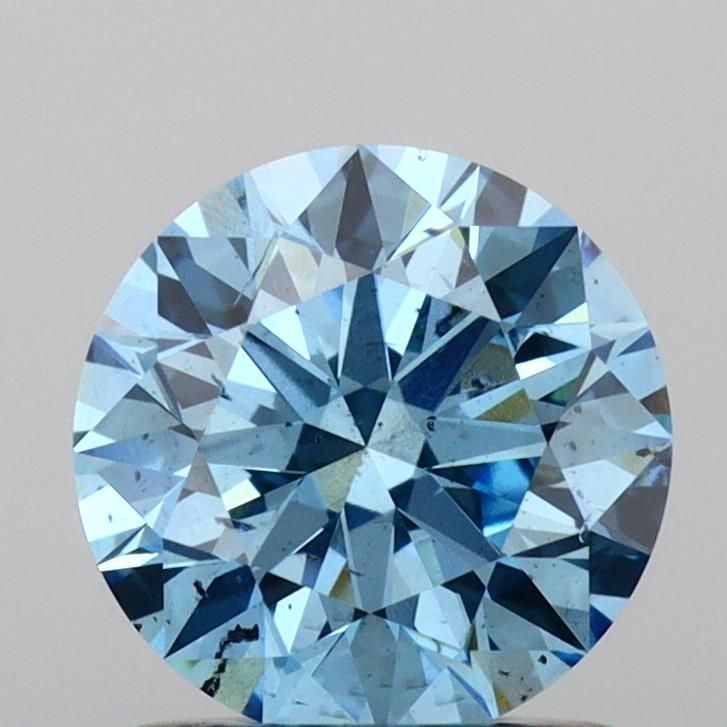 Ideal Loose Diamond - ROUND 1.04ct Fancy Vivid Blue SI2: Ideal Loose Diamond - ROUND 1.04ct Fancy Vivid Blue SI2 Source: This is a real non-mined Diamond that has been grown in a lab Shape: ROUND Carats: 1.04 Color: Fancy Vivid Blue Certification: IGI Video