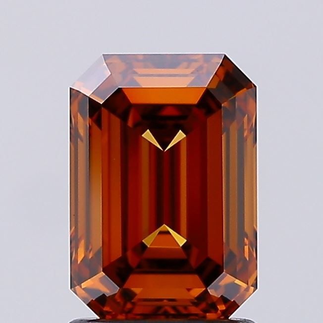 Loose Diamond - EMERALD 1.85ct Fancy Deep Orange VVS2: Loose Diamond - EMERALD 1.85ct Fancy Deep Orange VVS2 Source: This is a real non-mined Diamond that has been grown in a lab Shape: EMERALD Carats: 1.85 Color: Fancy Deep Orange Certification: IGI Vide