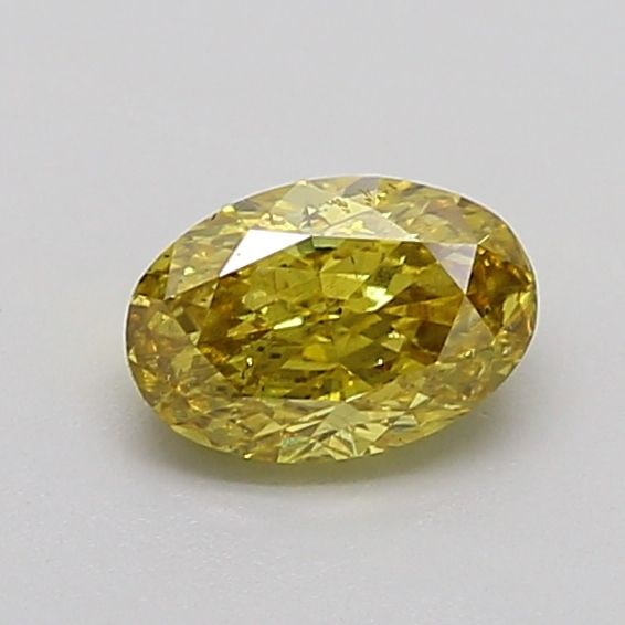 Loose Diamond - OVAL 0.9ct Fancy Vivid Yellow SI1: Loose Diamond - OVAL 0.9ct Fancy Vivid Yellow SI1 Source: This is a real non-mined Diamond that has been grown in a lab Shape: OVAL Carats: 0.9 Color: Fancy Vivid Yellow Certification: IGI Video:
