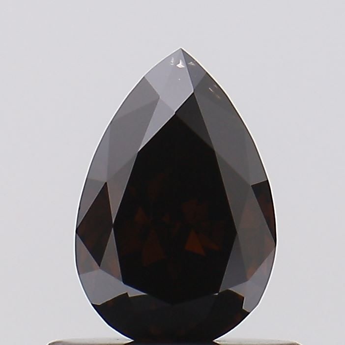 Loose Diamond - PEAR 0.52ct Fancy Deep Brown VS2: Loose Diamond - PEAR 0.52ct Fancy Deep Brown VS2 Source: This is a real non-mined Diamond that has been grown in a lab Shape: PEAR Carats: 0.52 Color: Fancy Deep Brown Certification: NONE Video: