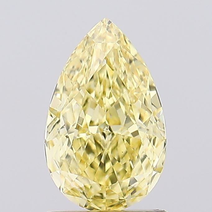 Loose Diamond - PEAR 1.29ct Fancy Vivid Yellow VS1: Loose Diamond - PEAR 1.29ct Fancy Vivid Yellow VS1 Source: This is a real non-mined Diamond that has been grown in a lab Shape: PEAR Carats: 1.29 Color: Fancy Vivid Yellow Certification: IGI Video: