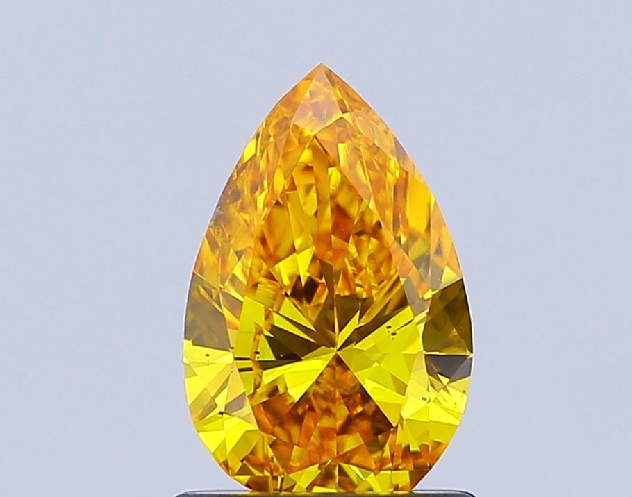 Loose Diamond - PEAR 1.0ct Fancy Vivid Yellow SI1: Loose Diamond - PEAR 1.0ct Fancy Vivid Yellow SI1 Source: This is a real non-mined Diamond that has been grown in a lab Shape: PEAR Carats: 1.0 Color: Fancy Vivid Yellow Certification: IGI Video: