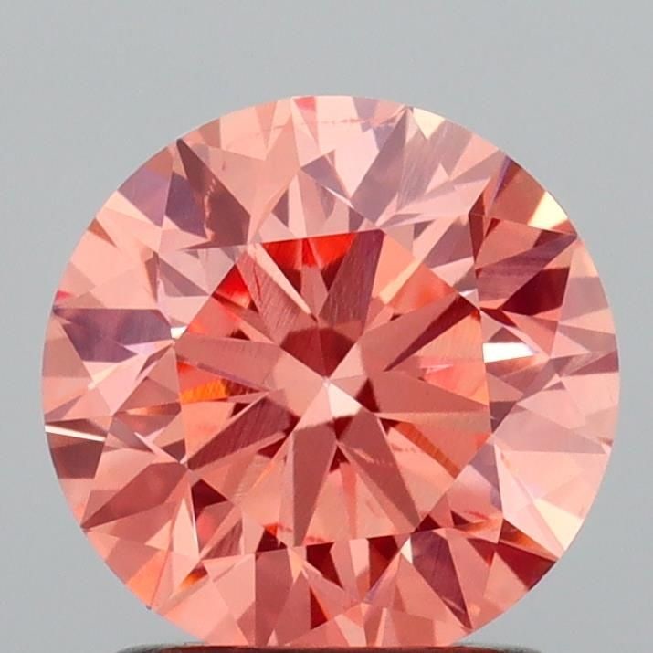 Loose Diamond - ROUND 1.5ct Fancy Vivid Orange Pink SI1: Loose Diamond - ROUND 1.5ct Fancy Vivid Orange Pink SI1 Source: This is a real non-mined Diamond that has been grown in a lab Shape: ROUND Carats: 1.5 Color: Fancy Vivid Orange Pink Certification: IGI
