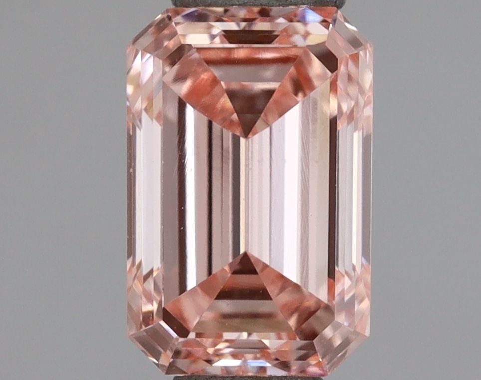 Loose Diamond - EMERALD 0.83ct Fancy Intense Pink VS2: Loose Diamond - EMERALD 0.83ct Fancy Intense Pink VS2 Source: This is a real non-mined Diamond that has been grown in a lab Shape: EMERALD Carats: 0.83 Color: Fancy Intense Pink Certification: IGI Vid