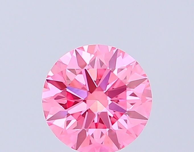 Loose Diamond - ROUND 0.51ct Fancy Vivid Pink VVS2: Loose Diamond - ROUND 0.51ct Fancy Vivid Pink VVS2 Source: This is a real non-mined Diamond that has been grown in a lab Shape: ROUND Carats: 0.51 Color: Fancy Vivid Pink Certification: IGI Video: