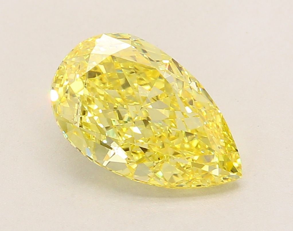 Loose Diamond - PEAR 2.99ct Fancy Vivid Yellow VVS2: Loose Diamond - PEAR 2.99ct Fancy Vivid Yellow VVS2 Source: This is a real non-mined Diamond that has been grown in a lab Shape: PEAR Carats: 2.99 Color: Fancy Vivid Yellow Certification: IGI Video: