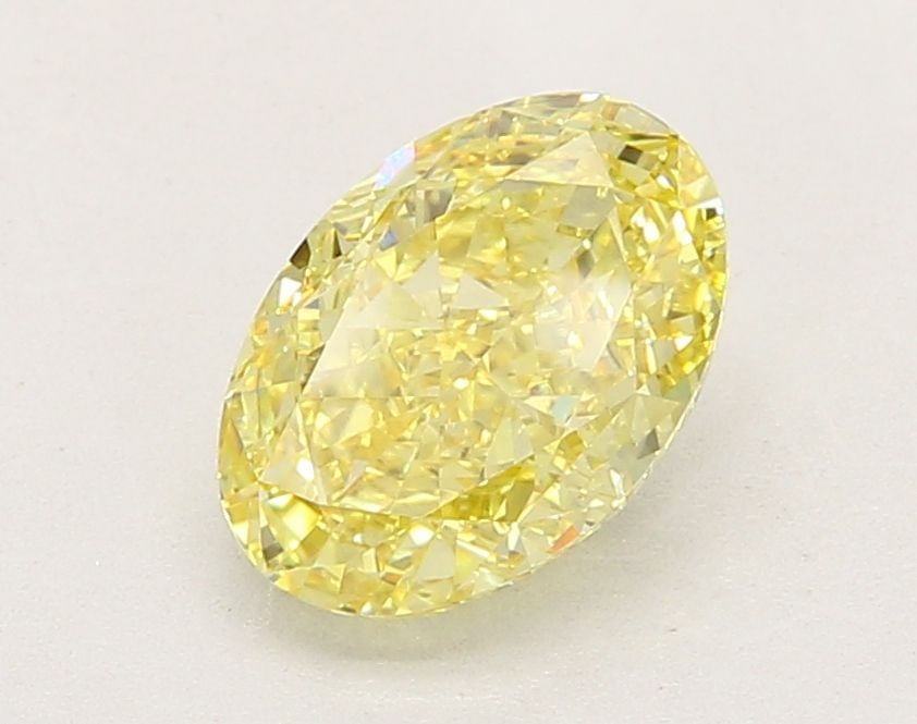 Loose Diamond - OVAL 2.14ct Fancy Vivid Yellow VVS2: Loose Diamond - OVAL 2.14ct Fancy Vivid Yellow VVS2 Source: This is a real non-mined Diamond that has been grown in a lab Shape: OVAL Carats: 2.14 Color: Fancy Vivid Yellow Certification: IGI Video: