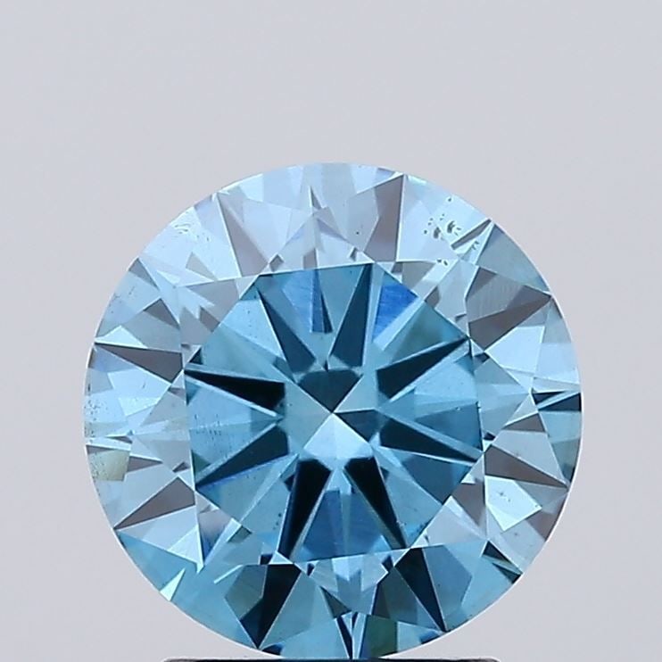 Loose Diamond - ROUND 1.99ct Fancy Vivid Blue VS2: Loose Diamond - ROUND 1.99ct Fancy Vivid Blue VS2 Source: This is a real non-mined Diamond that has been grown in a lab Shape: ROUND Carats: 1.99 Color: Fancy Vivid Blue Certification: IGI Video: