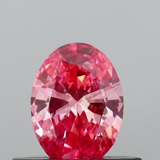 Loose Diamond - OVAL 0.38ct Fancy Vivid Pink VS1: Loose Diamond - OVAL 0.38ct Fancy Vivid Pink VS1 Source: This is a real non-mined Diamond that has been grown in a lab Shape: OVAL Carats: 0.38 Color: Fancy Vivid Pink Certification: IGI Video:
