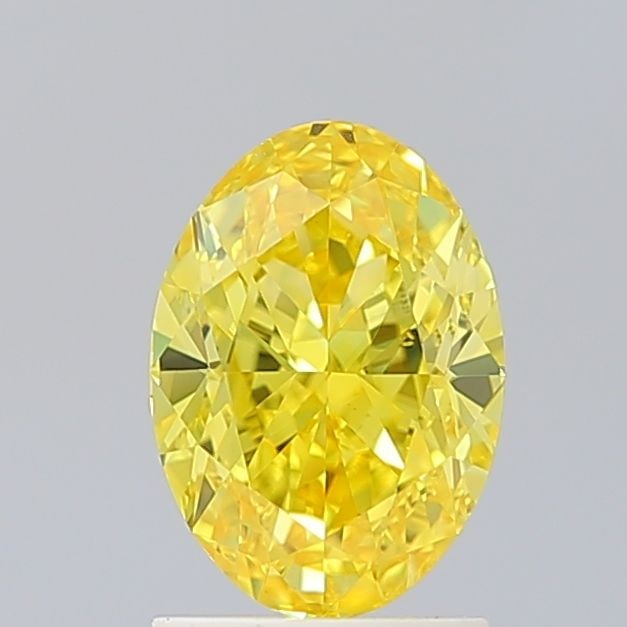 Loose Diamond - OVAL 2.02ct Fancy Vivid Yellow VVS2: Loose Diamond - OVAL 2.02ct Fancy Vivid Yellow VVS2 Source: This is a real non-mined Diamond that has been grown in a lab Shape: OVAL Carats: 2.02 Color: Fancy Vivid Yellow Certification: IGI Video: