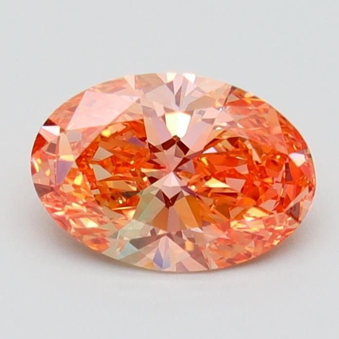 Loose Diamond - OVAL 1.08ct Fancy Vivid Orange Pink IF: Loose Diamond - OVAL 1.08ct Fancy Vivid Orange Pink IF Source: This is a real non-mined Diamond that has been grown in a lab Shape: OVAL Carats: 1.08 Color: Fancy Vivid Orange Pink Certification: IGI