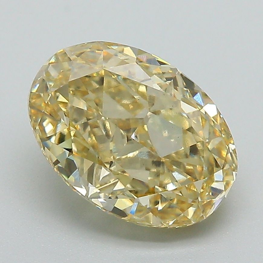 Loose Diamond - OVAL 3.08ct Fancy Intense Yellow VS1: Loose Diamond - OVAL 3.08ct Fancy Intense Yellow VS1 Source: This is a real non-mined Diamond that has been grown in a lab Shape: OVAL Carats: 3.08 Color: Fancy Intense Yellow Certification: IGI Video