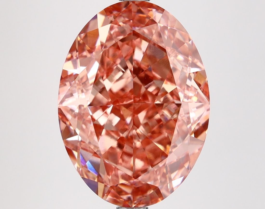 Loose Diamond - OVAL 7.03ct Fancy Vivid Pink VS1: Loose Diamond - OVAL 7.03ct Fancy Vivid Pink VS1 Source: This is a real non-mined Diamond that has been grown in a lab Shape: OVAL Carats: 7.03 Color: Fancy Vivid Pink Certification: IGI Video: