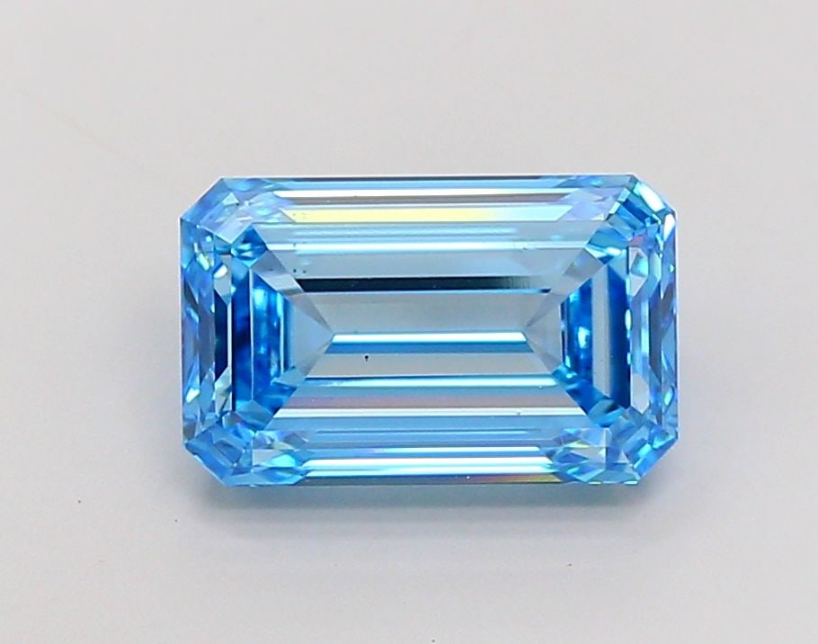 Loose Diamond - EMERALD 6.55ct Fancy Vivid Blue VS1: Loose Diamond - EMERALD 6.55ct Fancy Vivid Blue VS1 Source: This is a real non-mined Diamond that has been grown in a lab Shape: EMERALD Carats: 6.55 Color: Fancy Vivid Blue Certification: IGI Video: