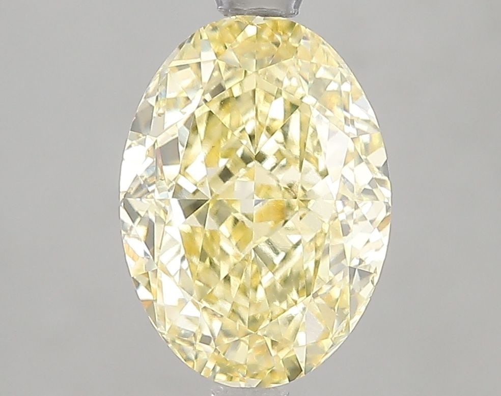 Loose Diamond - OVAL 3.01ct Fancy Intense Yellow VS2: Loose Diamond - OVAL 3.01ct Fancy Intense Yellow VS2 Source: This is a real non-mined Diamond that has been grown in a lab Shape: OVAL Carats: 3.01 Color: Fancy Intense Yellow Certification: IGI Video