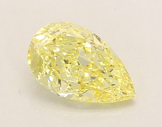 Loose Diamond - PEAR 1.03ct Fancy Intense Yellow VVS2: Loose Diamond - PEAR 1.03ct Fancy Intense Yellow VVS2 Source: This is a real non-mined Diamond that has been grown in a lab Shape: PEAR Carats: 1.03 Color: Fancy Intense Yellow Certification: IGI Vide
