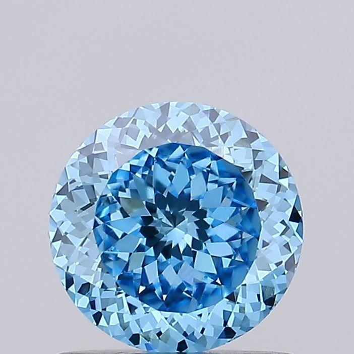 Loose Diamond - ROUND 0.94ct Fancy Vivid Blue VVS2: Loose Diamond - ROUND 0.94ct Fancy Vivid Blue VVS2 Source: This is a real non-mined Diamond that has been grown in a lab Shape: ROUND Carats: 0.94 Color: Fancy Vivid Blue Certification: IGI Video: