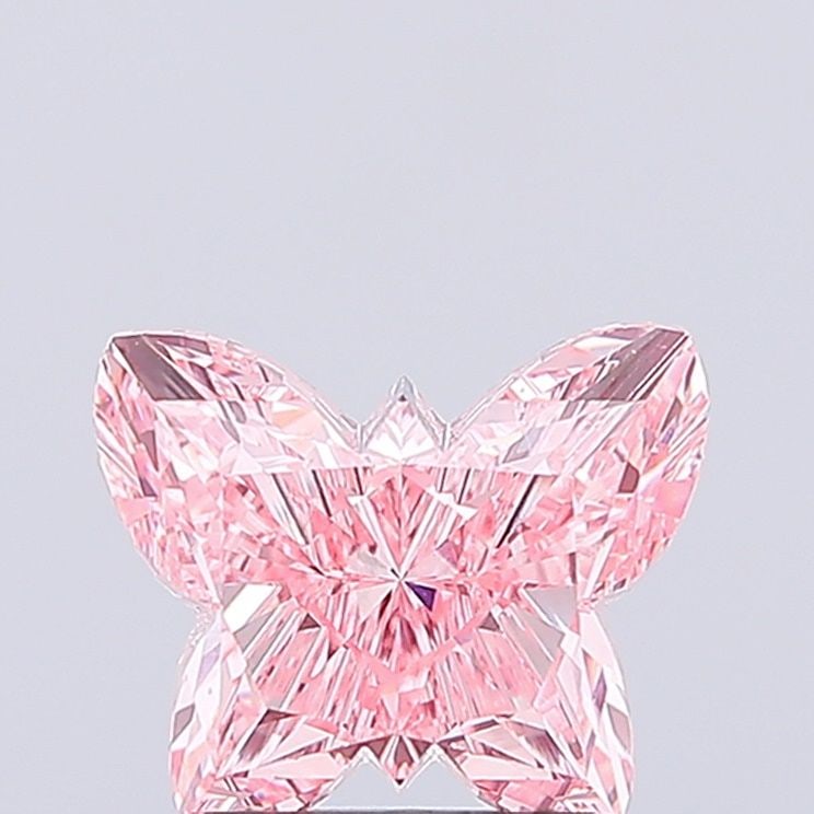 Loose Diamond - OTHER 2.61ct Fancy Vivid Pink VS1: Loose Diamond - OTHER 2.61ct Fancy Vivid Pink VS1 Source: This is a real non-mined Diamond that has been grown in a lab Shape: OTHER Carats: 2.61 Color: Fancy Vivid Pink Certification: IGI Video: