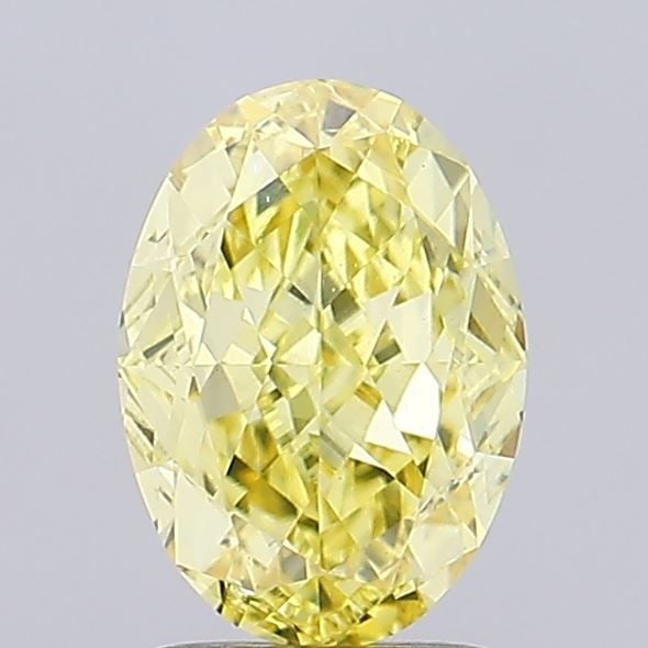 Loose Diamond - OVAL 1.9ct Fancy Vivid Yellow VS1: Loose Diamond - OVAL 1.9ct Fancy Vivid Yellow VS1 Source: This is a real non-mined Diamond that has been grown in a lab Shape: OVAL Carats: 1.9 Color: Fancy Vivid Yellow Certification: IGI Video: