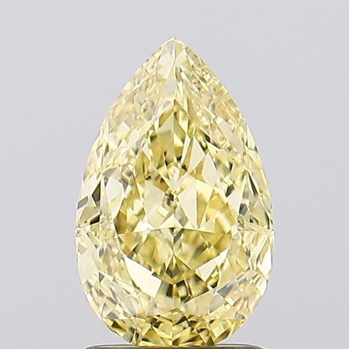 Loose Diamond - PEAR 1.53ct Fancy Vivid Yellow VVS2: Loose Diamond - PEAR 1.53ct Fancy Vivid Yellow VVS2 Source: This is a real non-mined Diamond that has been grown in a lab Shape: PEAR Carats: 1.53 Color: Fancy Vivid Yellow Certification: IGI Video: