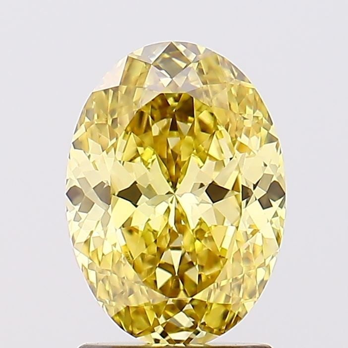 Loose Diamond - OVAL 1.61ct Fancy Vivid Yellow VVS2: Loose Diamond - OVAL 1.61ct Fancy Vivid Yellow VVS2 Source: This is a real non-mined Diamond that has been grown in a lab Shape: OVAL Carats: 1.61 Color: Fancy Vivid Yellow Certification: IGI Video: