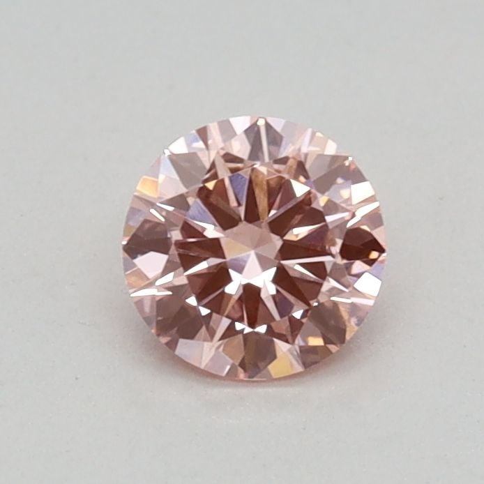 Loose Diamond - ROUND 0.32ct Fancy Vivid Pink VS1: Loose Diamond - ROUND 0.32ct Fancy Vivid Pink VS1 Source: This is a real non-mined Diamond that has been grown in a lab Shape: ROUND Carats: 0.32 Color: Fancy Vivid Pink Certification: IGI Video: