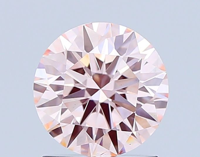Ideal Loose Diamond - ROUND 1.16ct Fancy Pink VS2: Ideal Loose Diamond - ROUND 1.16ct Fancy Pink VS2 Source: This is a real non-mined Diamond that has been grown in a lab Shape: ROUND Carats: 1.16 Color: Fancy Pink Certification: IGI Video: